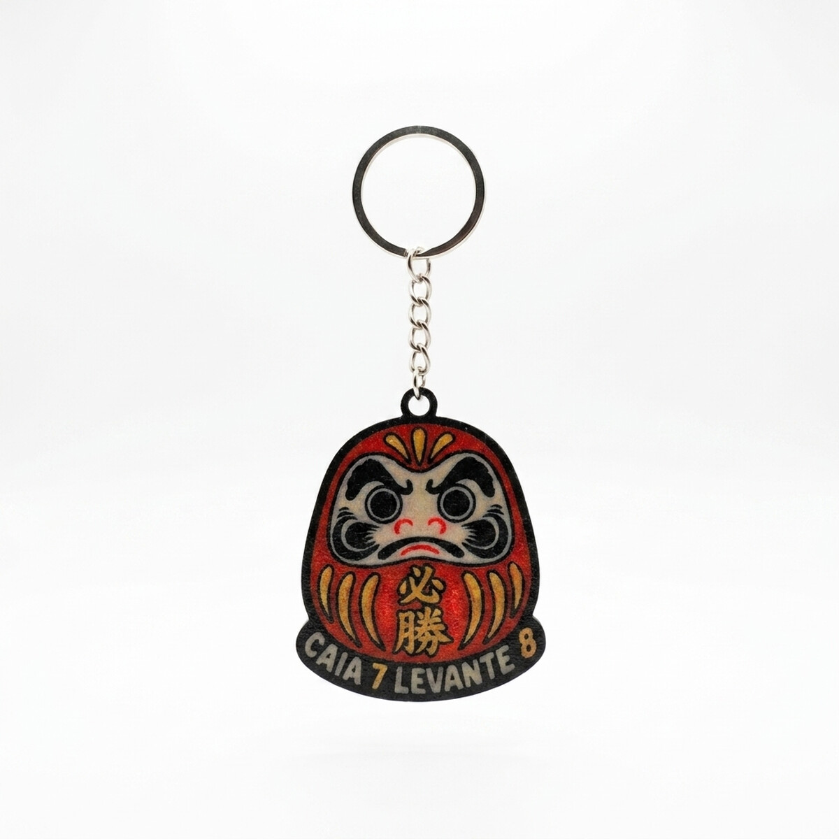 Chaveiro Daruma — Caia 7, Levante 8