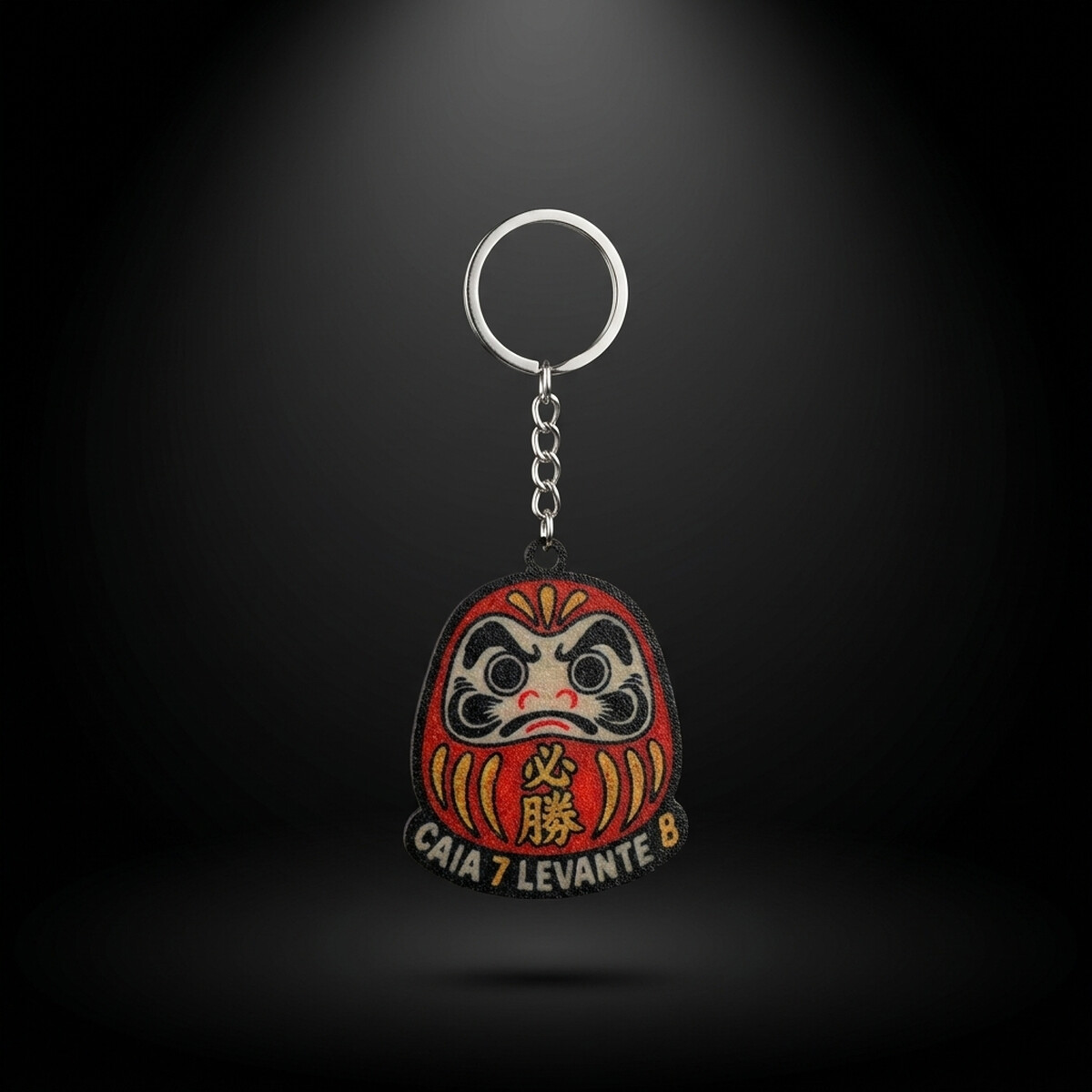 Chaveiro Daruma — Caia 7, Levante 8